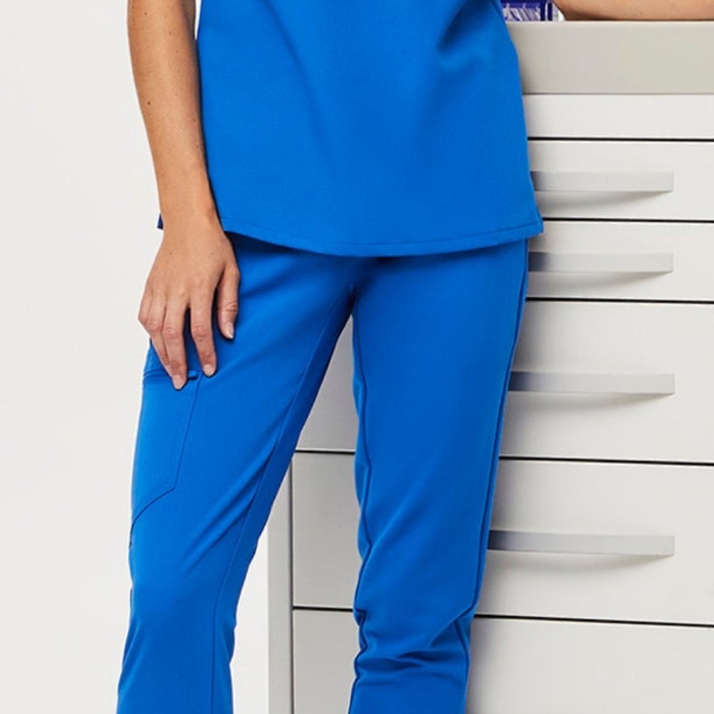 Women's scrub sets priced for each set.